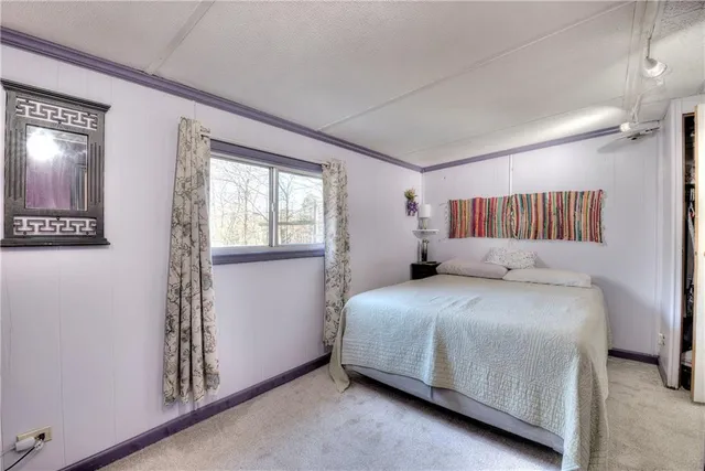 a bathroom with a sink vanity and a mirror
