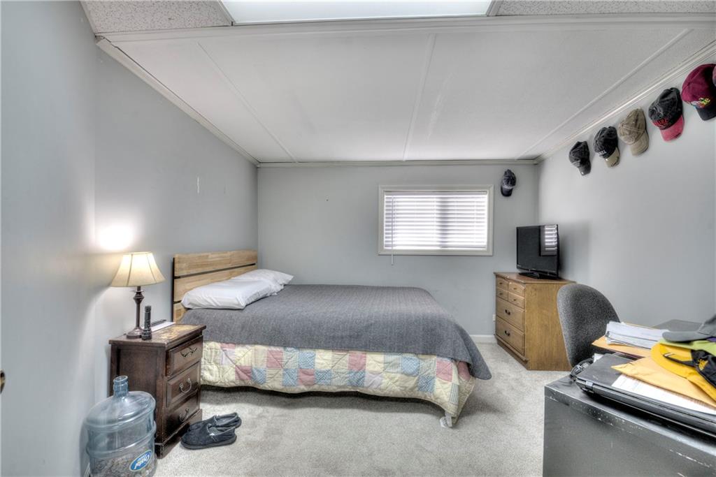 368 Pleasant Valley Road Northwest Adairsville, GA 30103 - Photo 28 of 31 a bedroom with a bed and a window