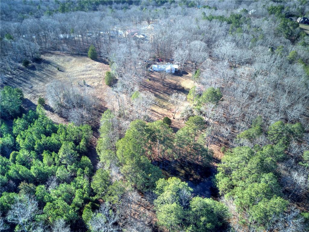 368 Pleasant Valley Road Northwest Adairsville, GA 30103 - Photo 5 of 31 a view of a lush green yard
