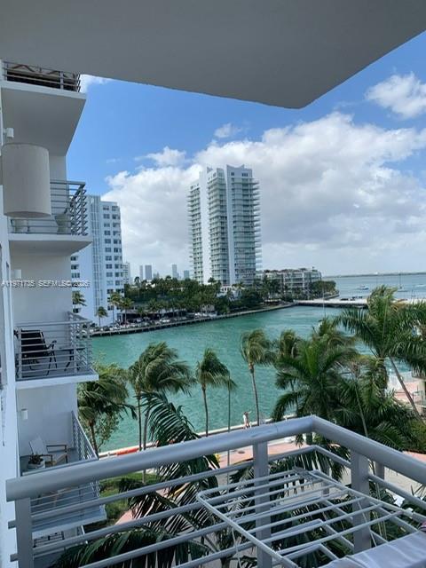 1450 Lincoln Road, Unit 604 Miami Beach, FL 33139 - Photo 1 of 16 a view of a lake with a terrace