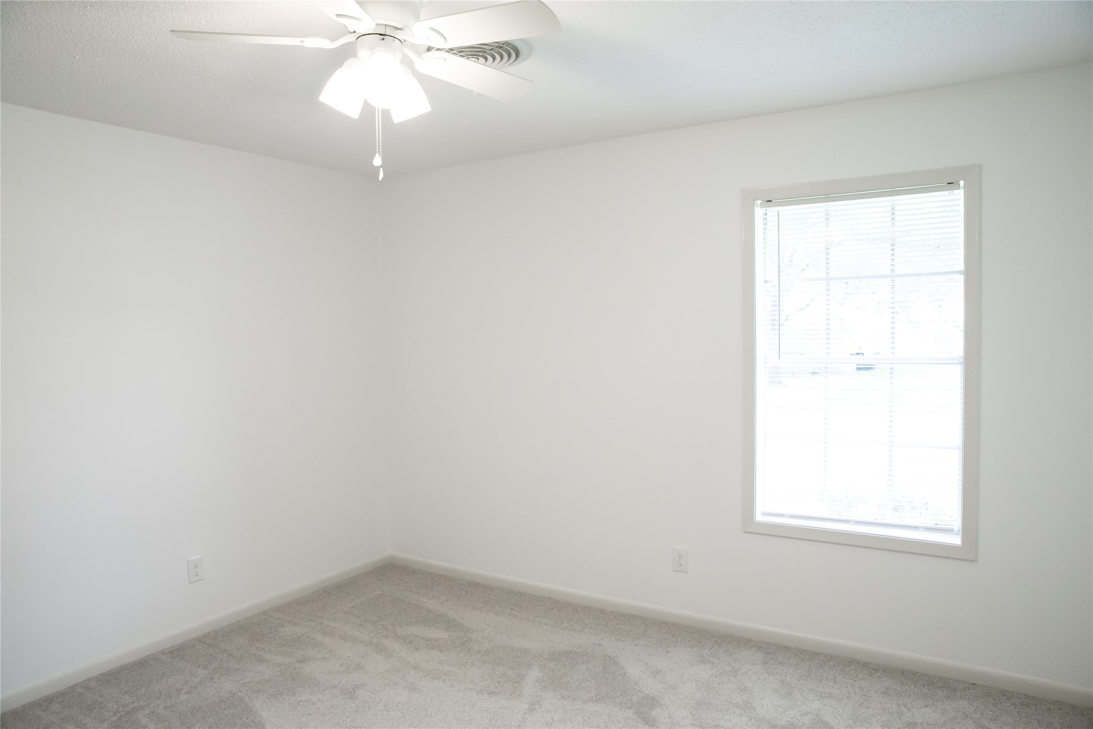 1600 Reimer Street Brenham, TX 77833 - Photo 18 of 24 an empty room with a window
