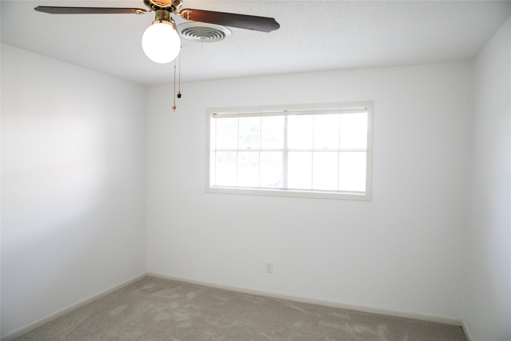 1600 Reimer Street Brenham, TX 77833 - Photo 19 of 24 an empty room with a window