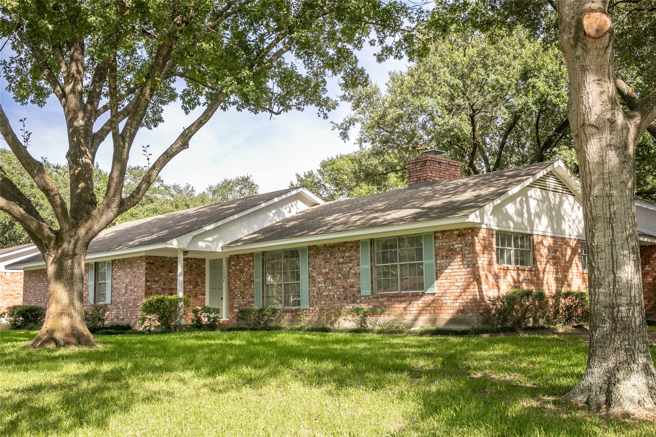 1600 Reimer Street Brenham, TX 77833 - Photo 24 of 24 a view of a house with a backyard