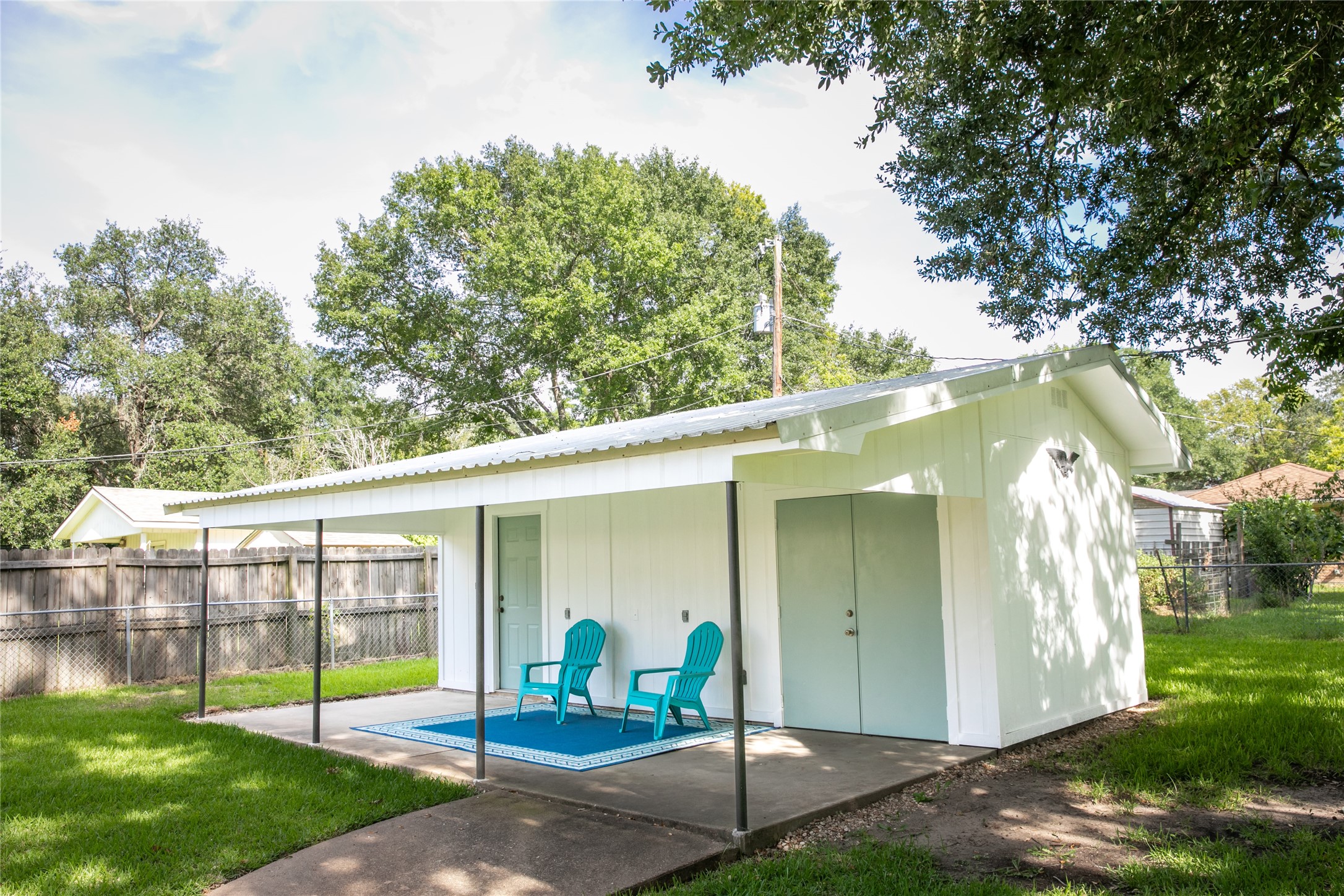 1600 Reimer Street Brenham, TX 77833 - Photo 6 of 24 a view of a house with backyard and a patio
