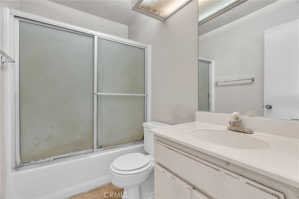 320 North Montebello Boulevard Montebello, CA 90640 - Photo 12 of 15 a bathroom with a sink toilet and shower