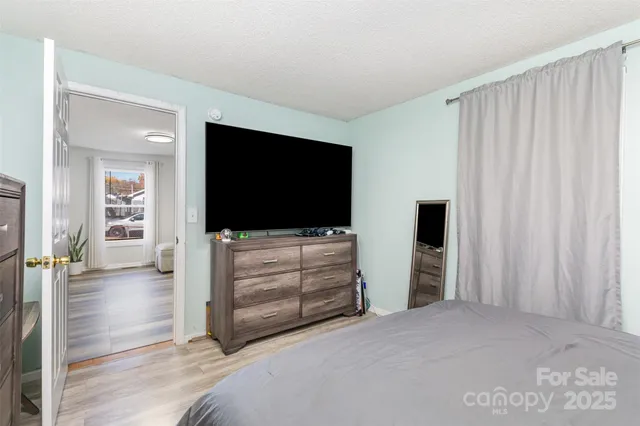 a room with furniture and a flat screen tv