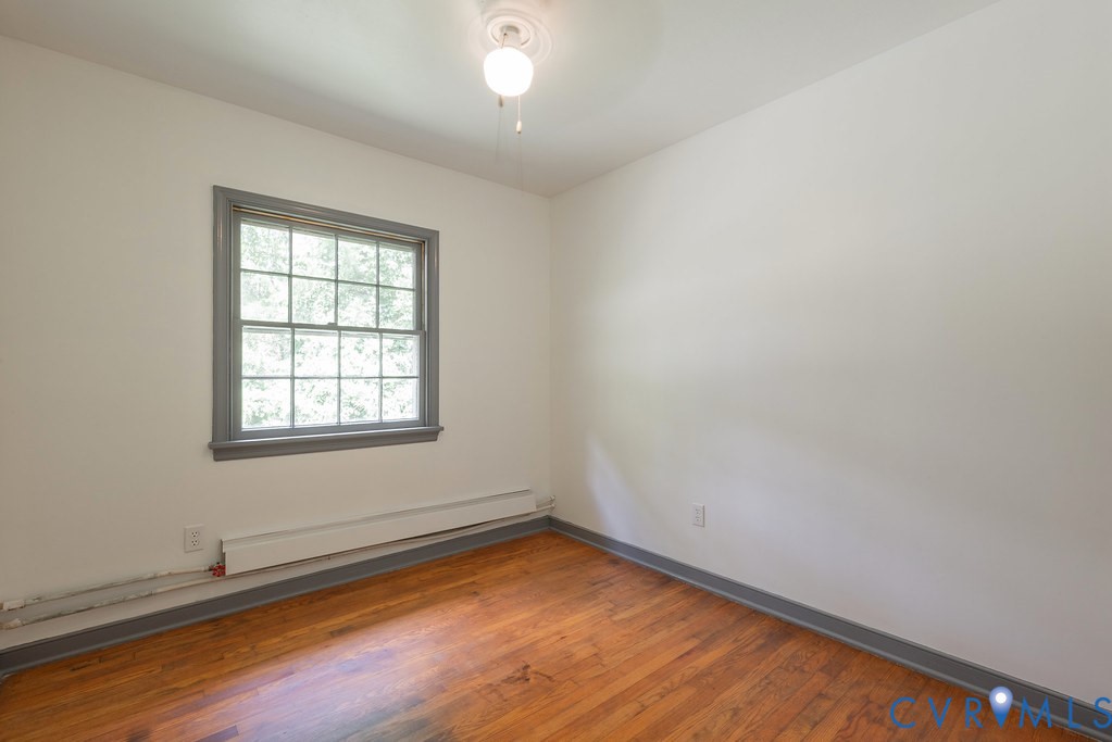 20100 Frog Level Road Ruther Glen, VA 22546 - Photo 11 of 28 Hardwood flooring, window with gray trim, ceiling-
