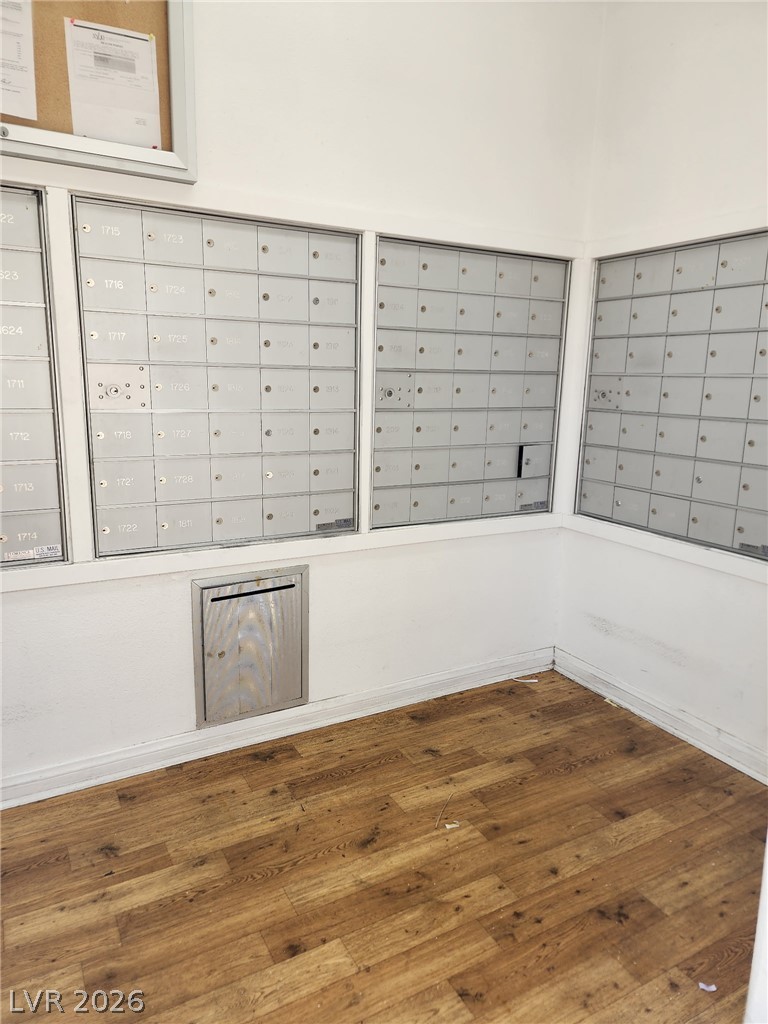 231 West Horizon Ridge Parkway, Unit 1127 Henderson, NV 89012 - Photo 11 of 39 Secure mailboxes for resident convenience, featuring rich wood-look flooring.