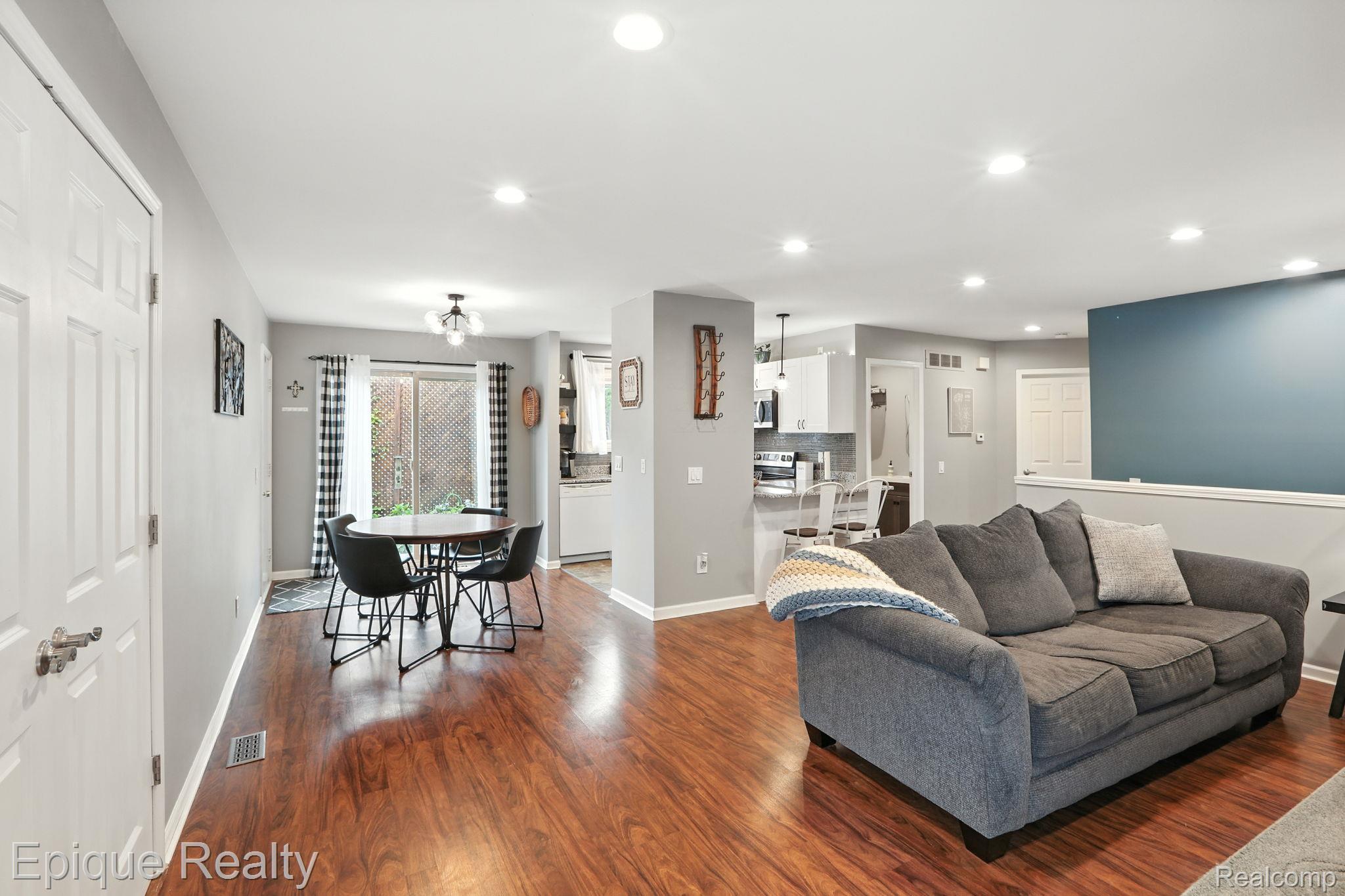 8529 22 Mile Road Utica, MI 48317 - Photo 22 of 40 Living area with recessed lighting and dark wood-type flooring