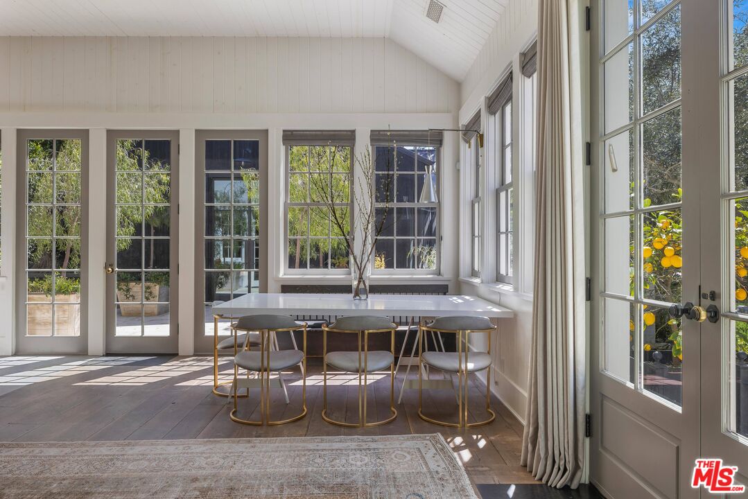 1701 Westridge Road Los Angeles, CA 90049 - Photo 18 of 36 a dining room with furniture and window