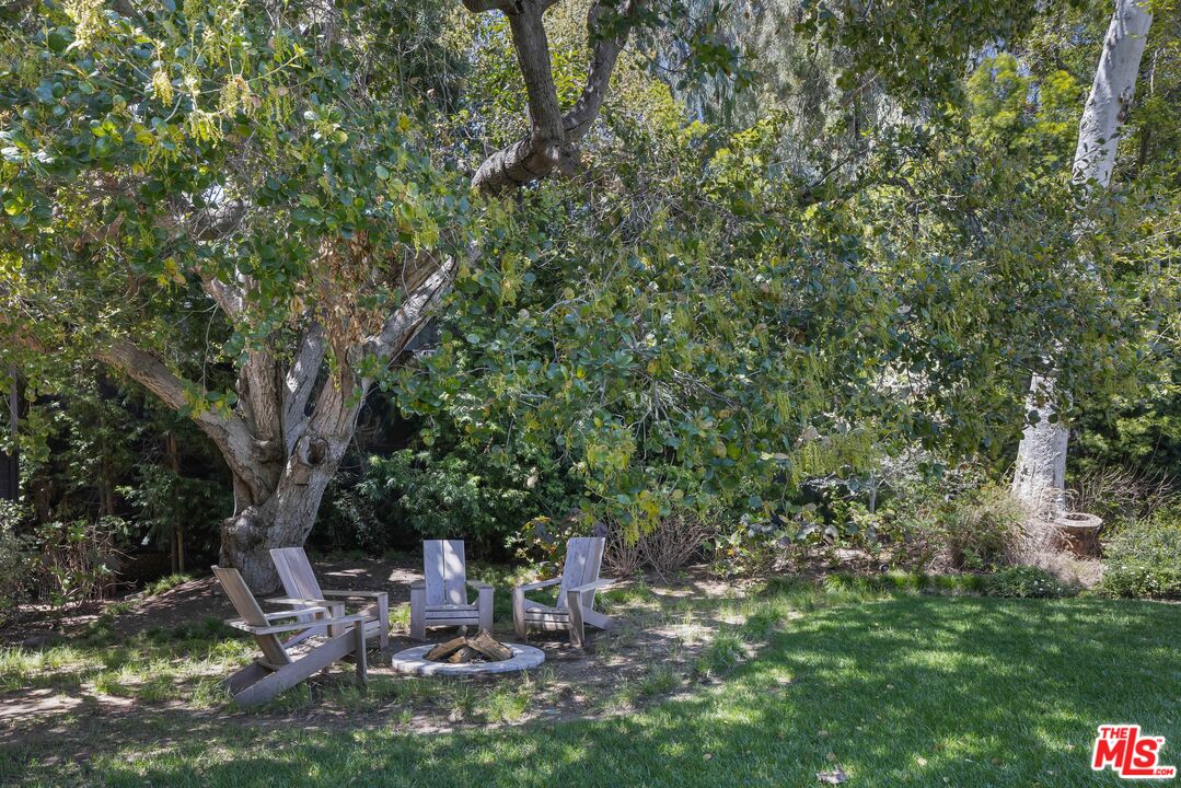 1701 Westridge Road Los Angeles, CA 90049 - Photo 23 of 36 a view of yard with green space