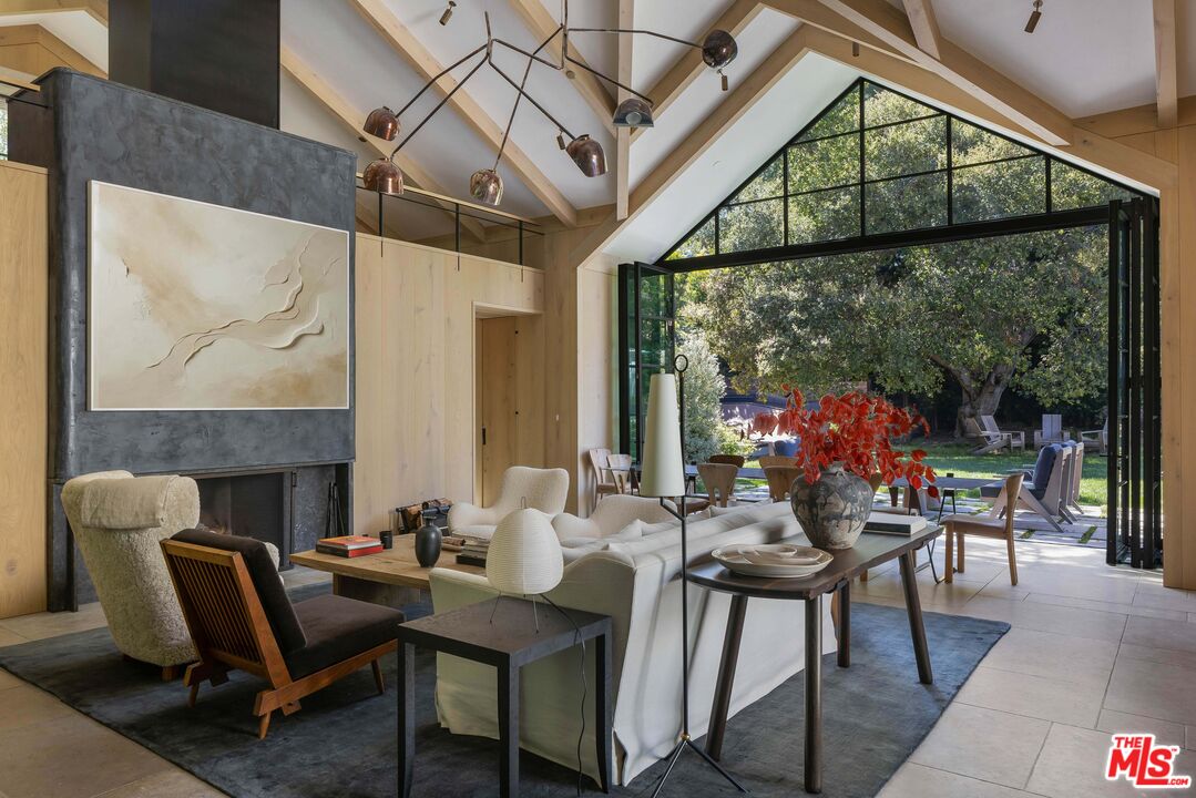 1701 Westridge Road Los Angeles, CA 90049 - Photo 30 of 36 a view of a dining room with furniture window and outside view