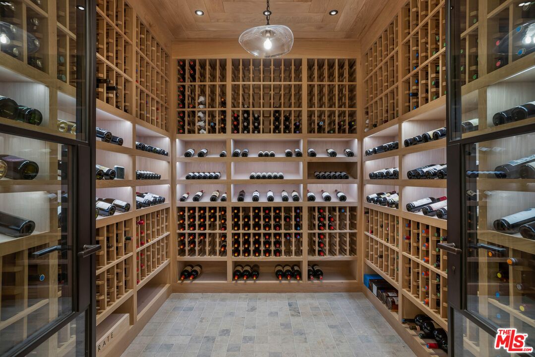 1701 Westridge Road Los Angeles, CA 90049 - Photo 32 of 36 a view of entryway with a book shelf