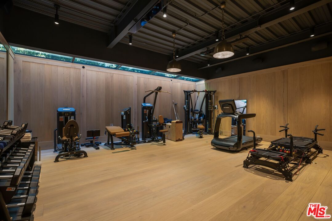 1701 Westridge Road Los Angeles, CA 90049 - Photo 33 of 36 a view of a room with gym equipment