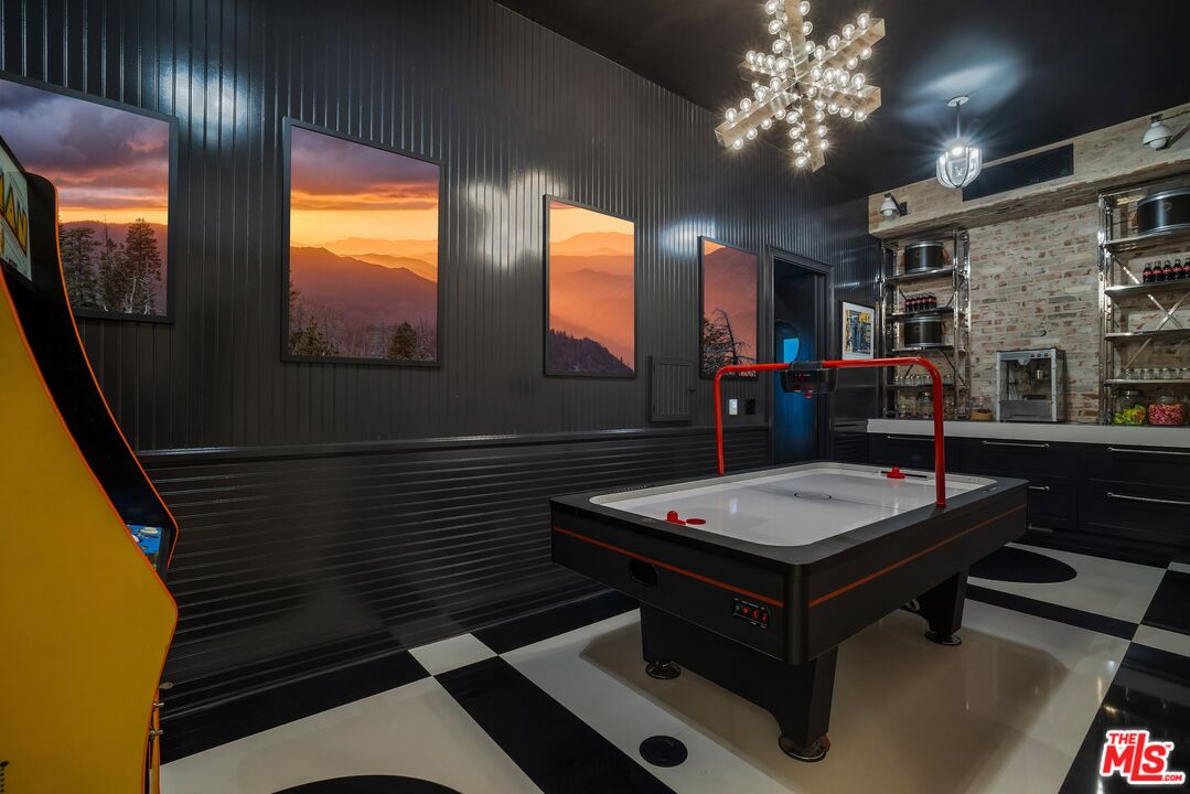 1701 Westridge Road Los Angeles, CA 90049 - Photo 34 of 36 a room with pool table and window