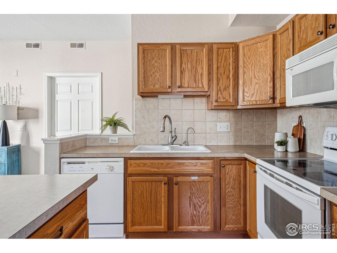 4501 Nelson Road, Unit 2303 Longmont, CO 80503 - Photo 16 of 36 Open kitchen