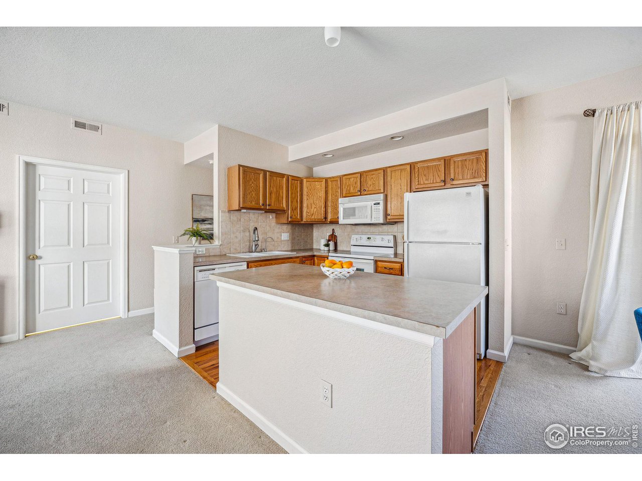 4501 Nelson Road, Unit 2303 Longmont, CO 80503 - Photo 17 of 36 Kitchen with spacious island