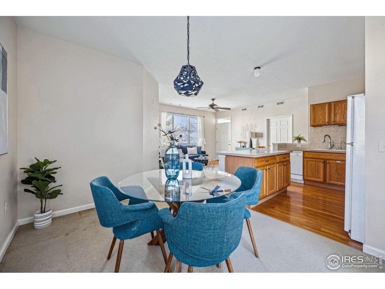 4501 Nelson Road, Unit 2303 Longmont, CO 80503 - Photo 2 of 36 Open dining room and kitchen