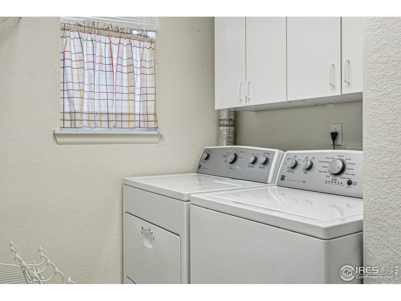 4501 Nelson Road, Unit 2303 Longmont, CO 80503 - Photo 25 of 36 Laundry room with extra storage