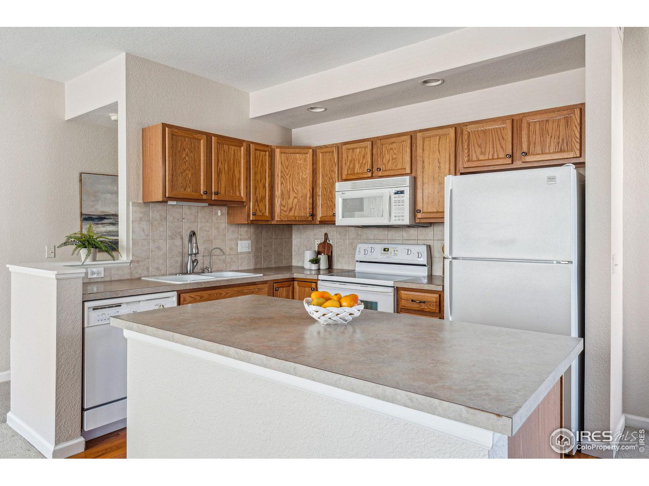 4501 Nelson Road, Unit 2303 Longmont, CO 80503 - Photo 3 of 36 Kitchen with ample storage