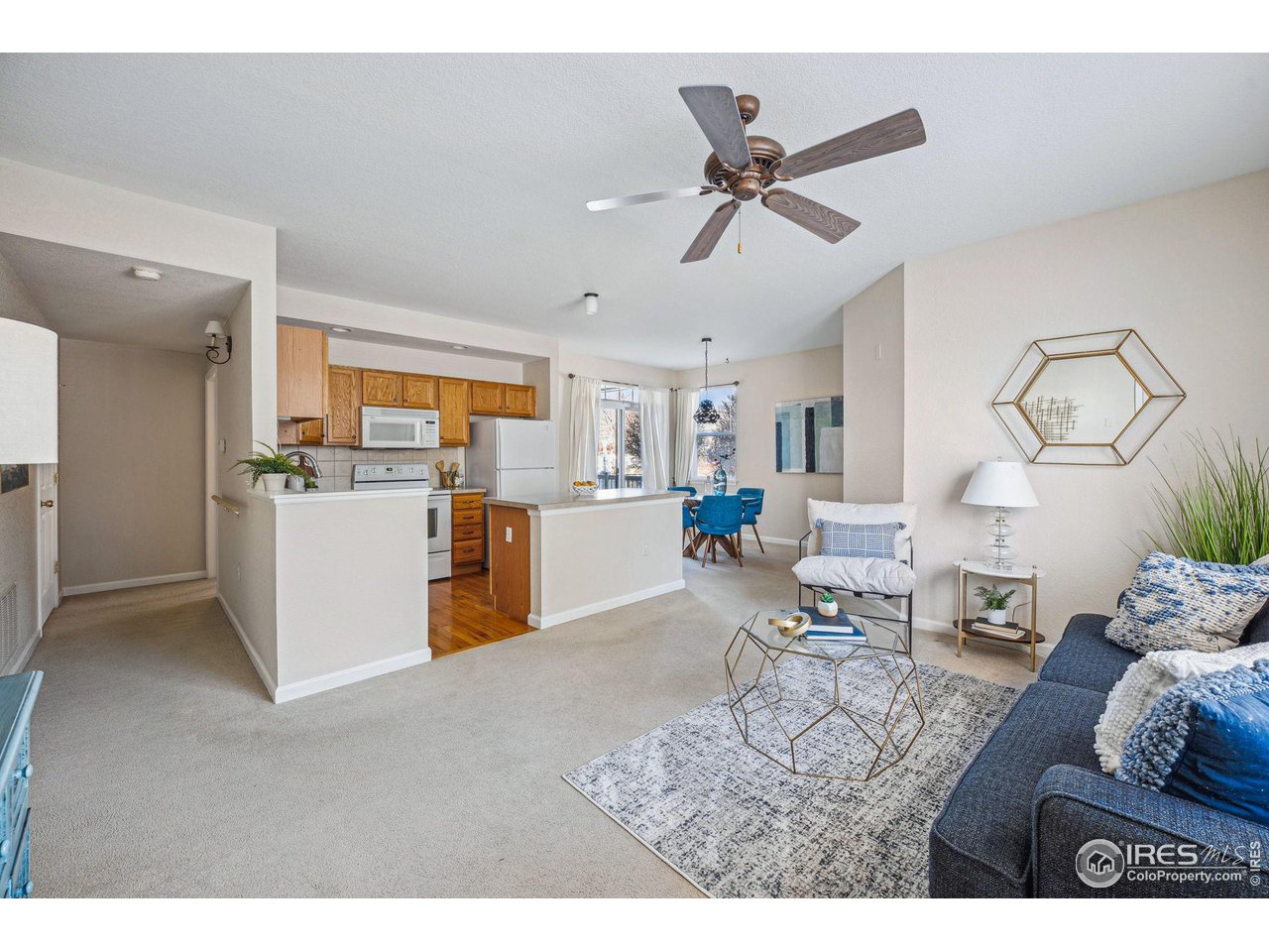 4501 Nelson Road, Unit 2303 Longmont, CO 80503 - Photo 9 of 36 Bright and open main living area