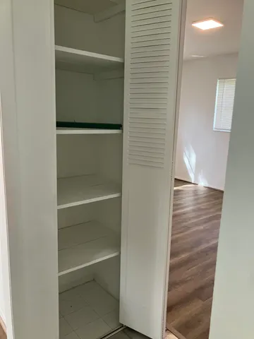 a view of a hallway with entryway