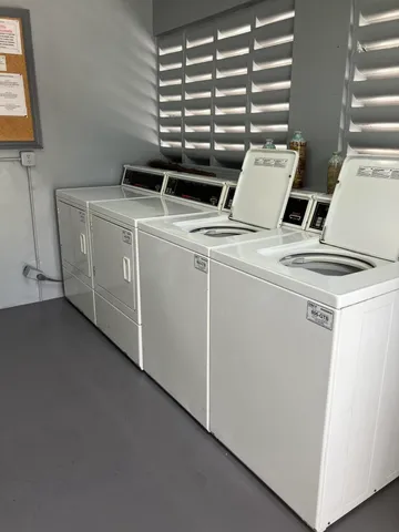 a bathroom with a sink a toilet and bathtub