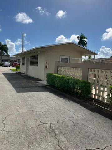 a view of a house with a street