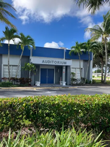 a view of a room with stairs and a window