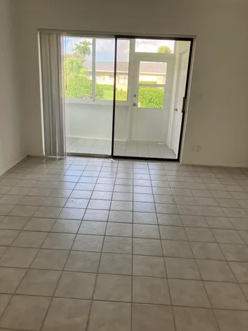 a view of a kitchen with a sink