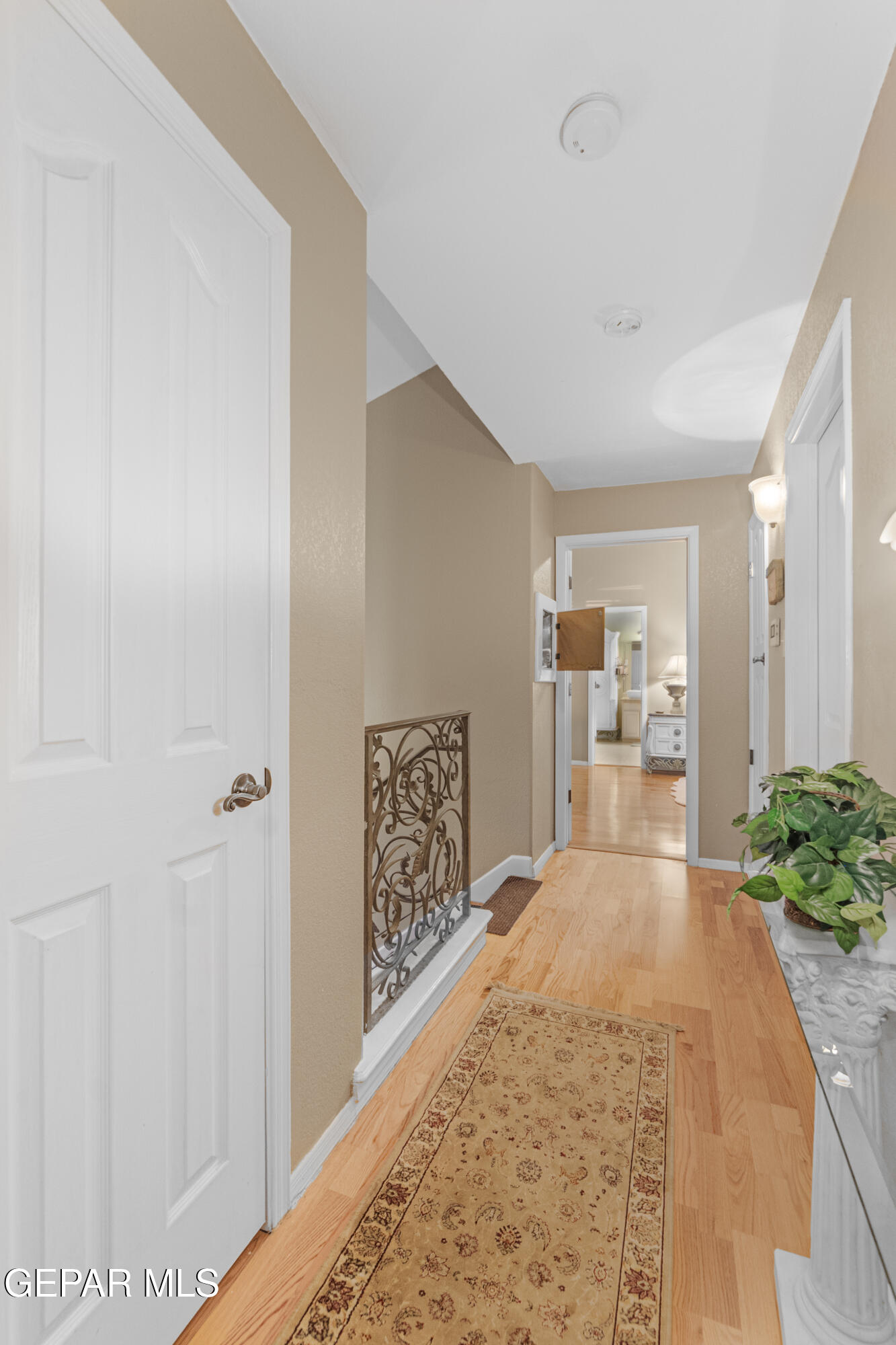1420 Cloud Ridge Drive El Paso, TX 79912 - Photo 30 of 77 Upstairs hall w/ Laundry Shute
