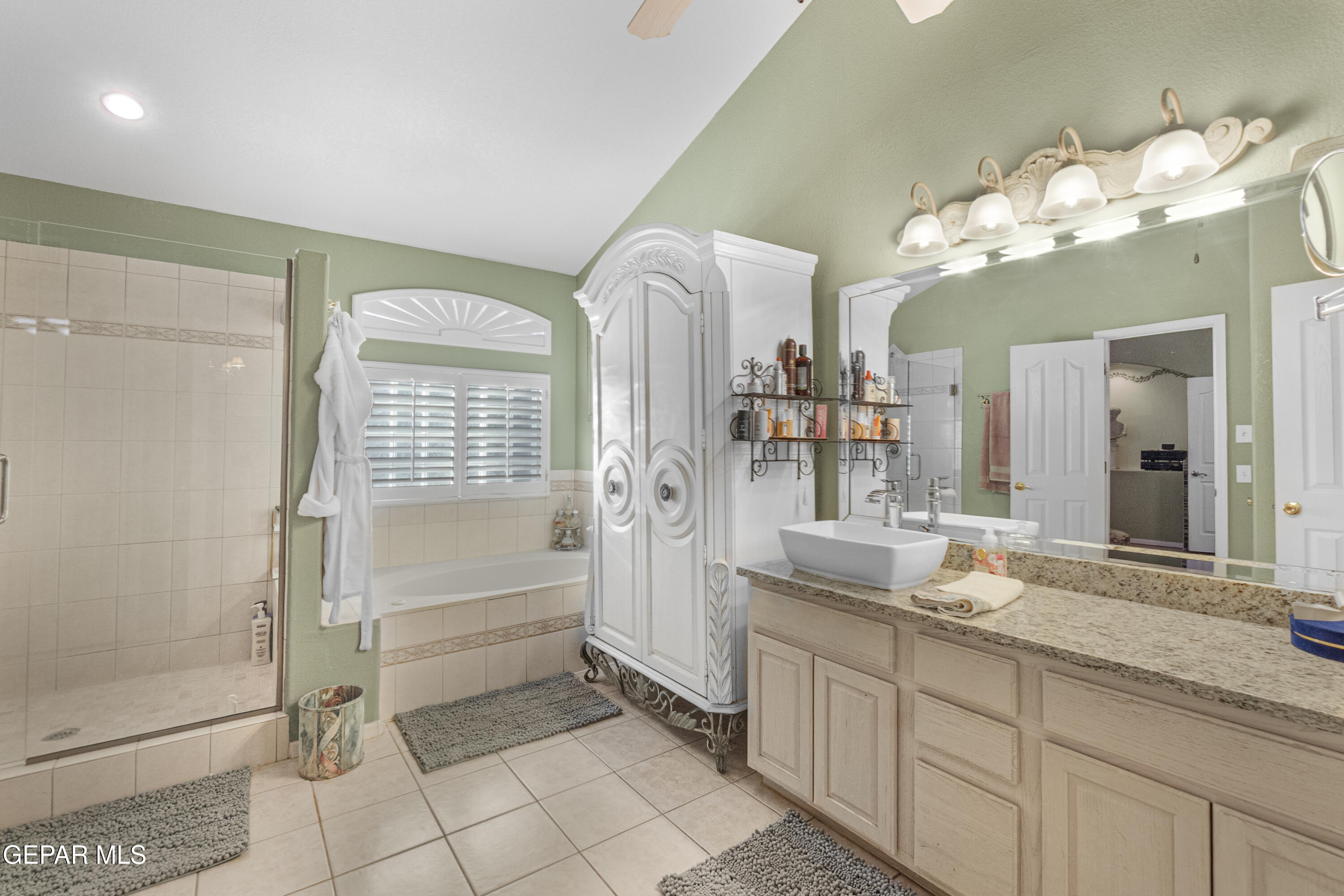 1420 Cloud Ridge Drive El Paso, TX 79912 - Photo 39 of 77 a bathroom with a double vanity sink and a mirror