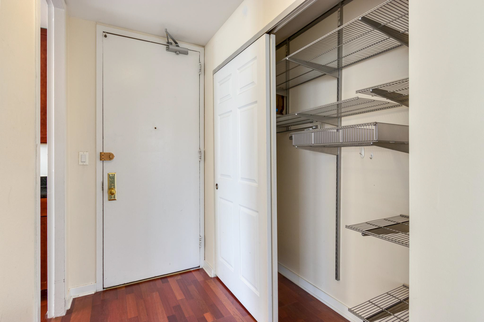655 West Irving Park Road, Unit 1502 Chicago, IL 60613 - Photo 11 of 24 a view of walk in closet with empty racks
