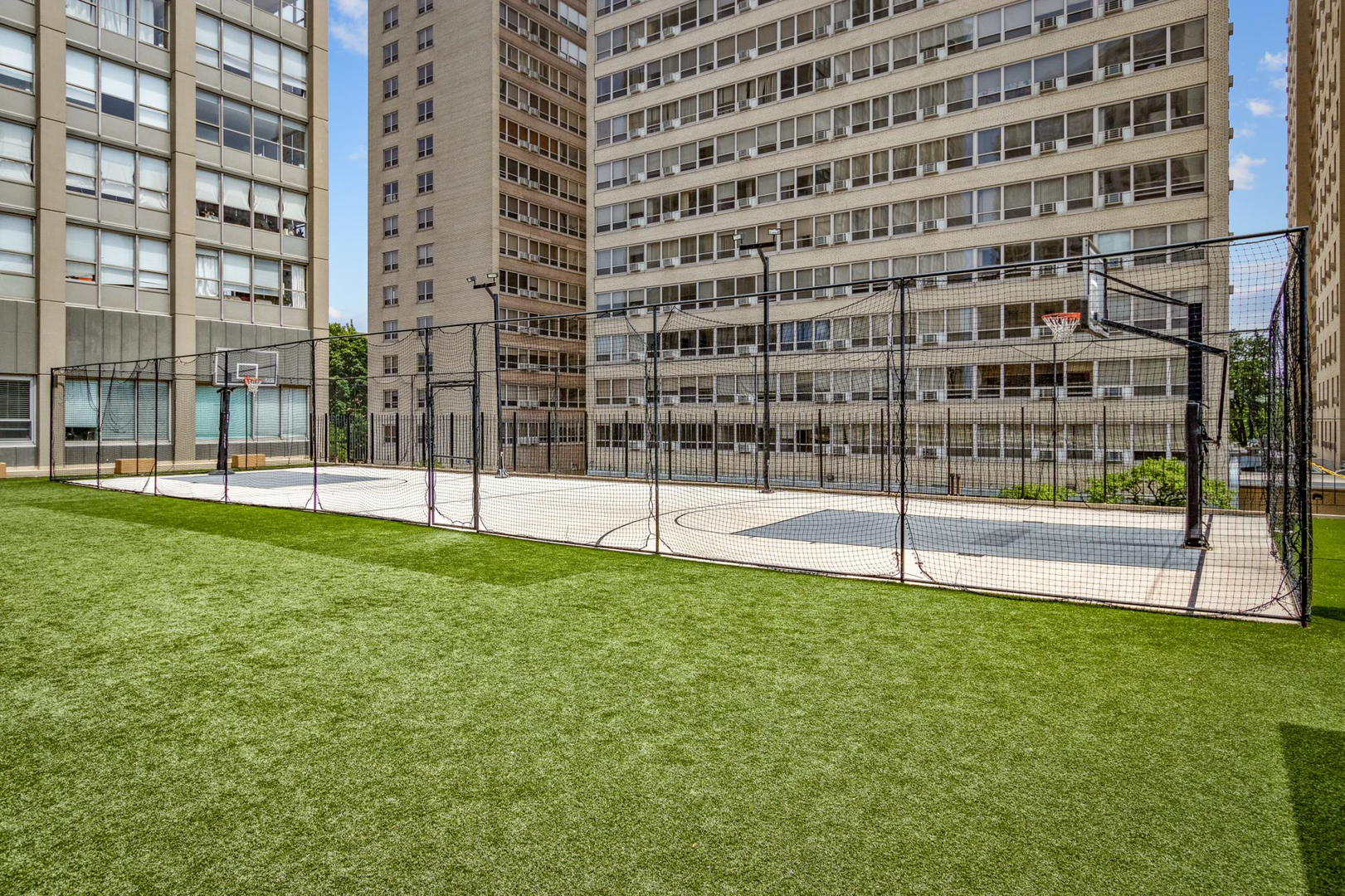 655 West Irving Park Road, Unit 1502 Chicago, IL 60613 - Photo 15 of 24 a view of building with a outdoor space