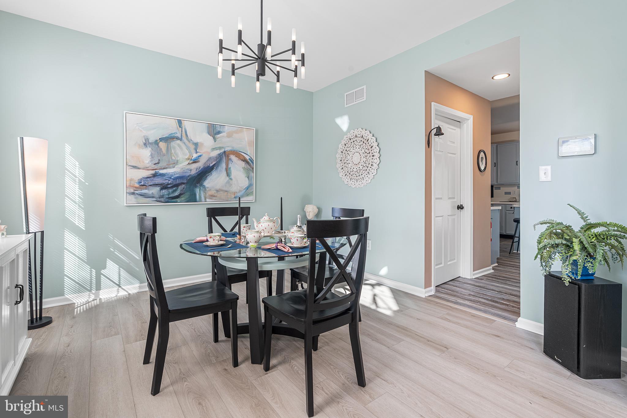 19 Howard Street Carneys Point, NJ 08069 - Photo 12 of 39 a view of a dining room with furniture and wooden floor