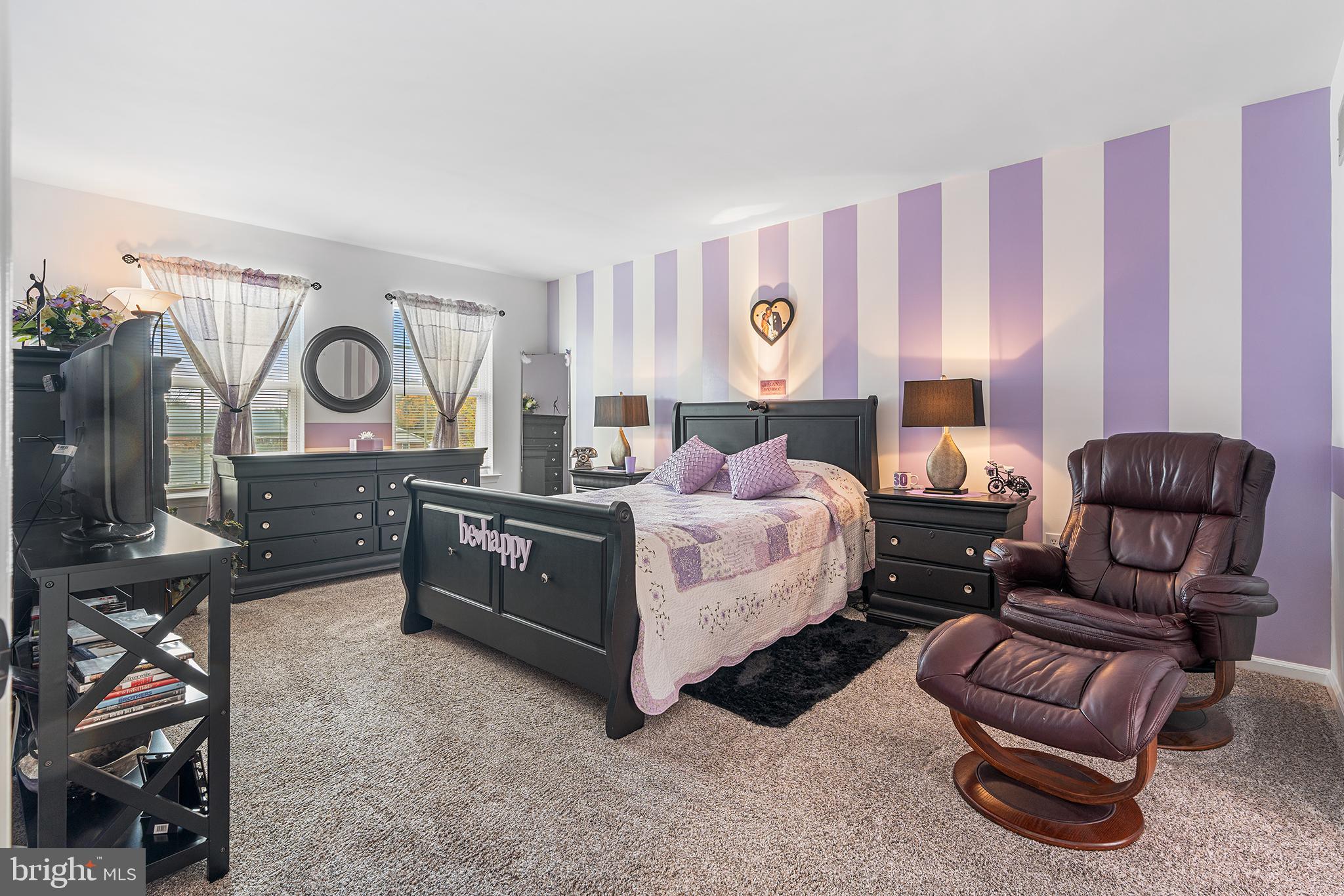 19 Howard Street Carneys Point, NJ 08069 - Photo 23 of 39 a bed room with a bed and a chair