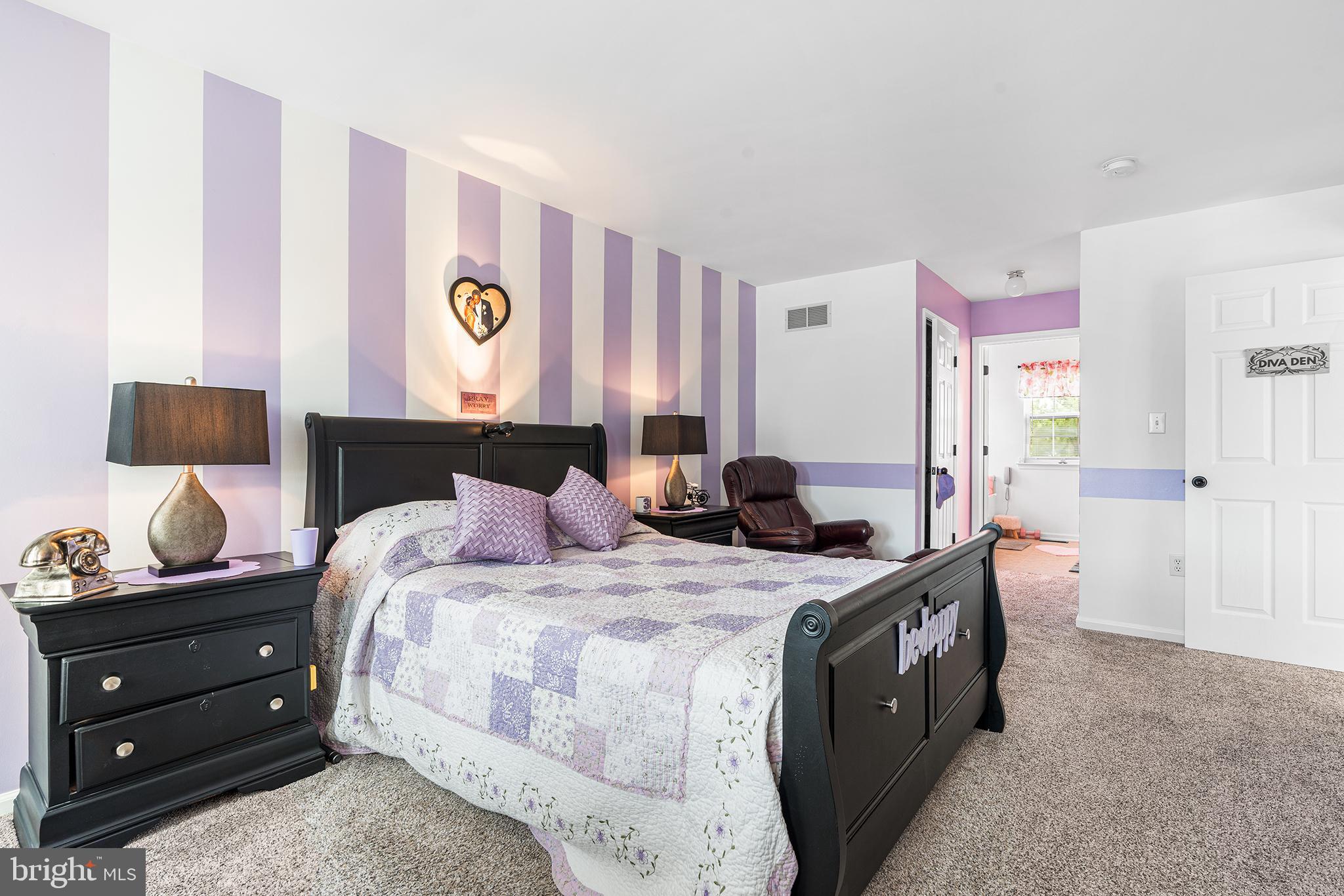 19 Howard Street Carneys Point, NJ 08069 - Photo 24 of 39 a bedroom with a bed and window