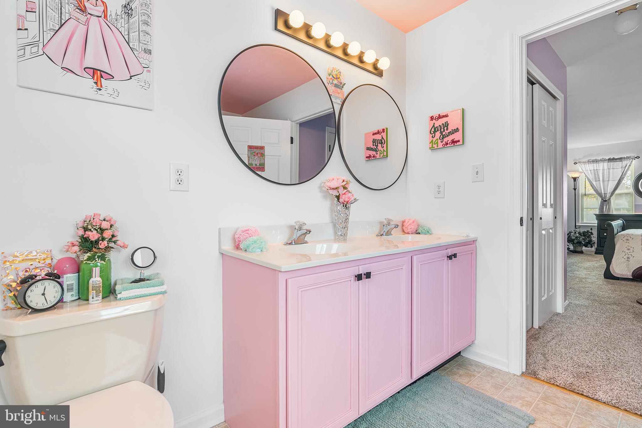 19 Howard Street Carneys Point, NJ 08069 - Photo 27 of 39 a bathroom with a sink mirror vanity and toilet