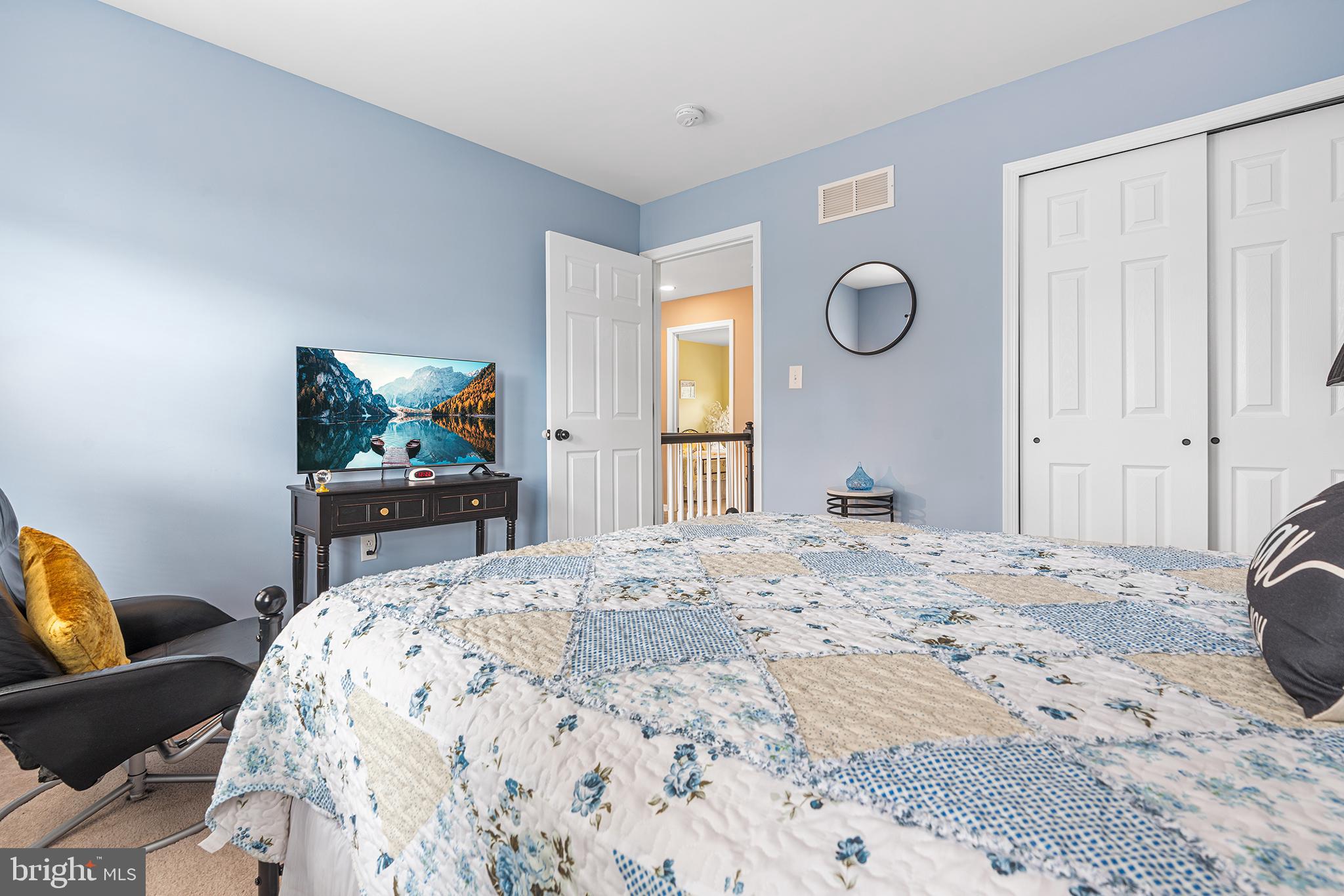 19 Howard Street Carneys Point, NJ 08069 - Photo 35 of 39 a bed room with a bed mirror and a window