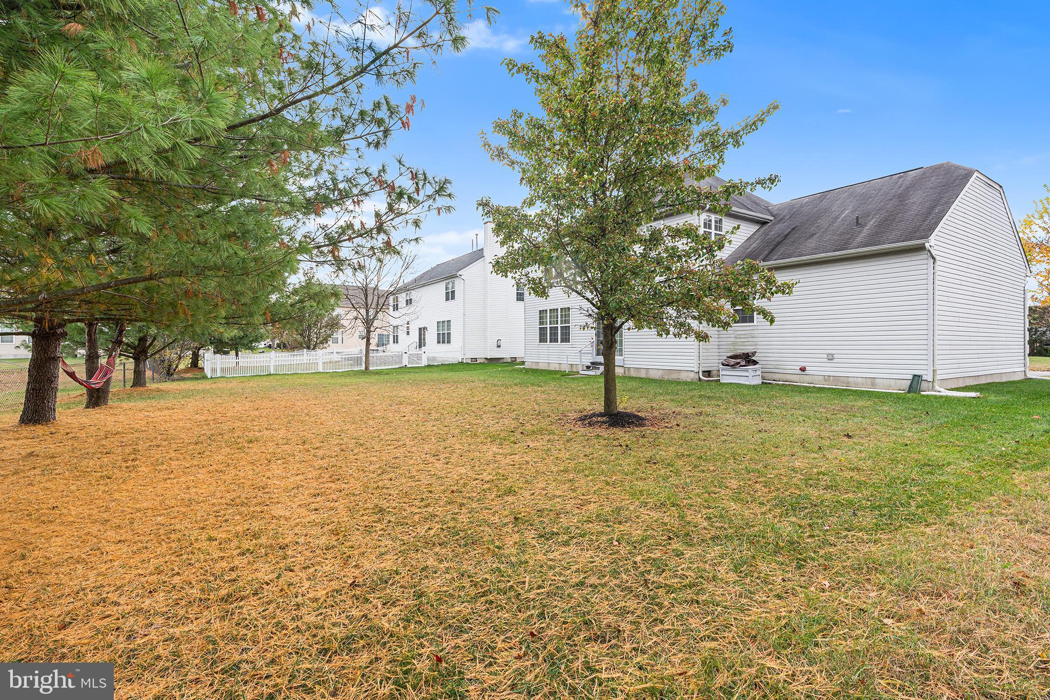 19 Howard Street Carneys Point, NJ 08069 - Photo 37 of 39 a view of a yard with a tree