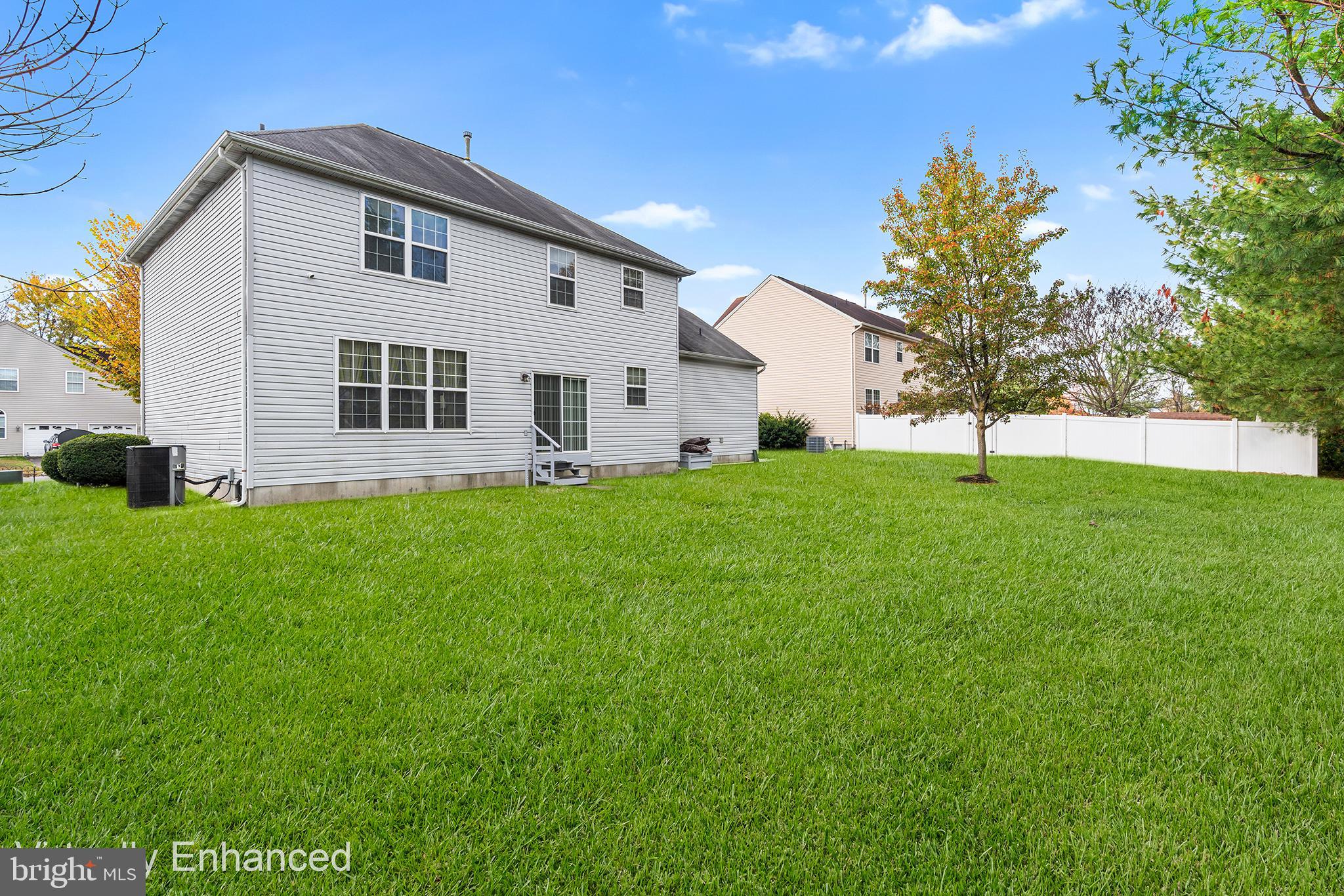 19 Howard Street Carneys Point, NJ 08069 - Photo 39 of 39 a large white house with a yard