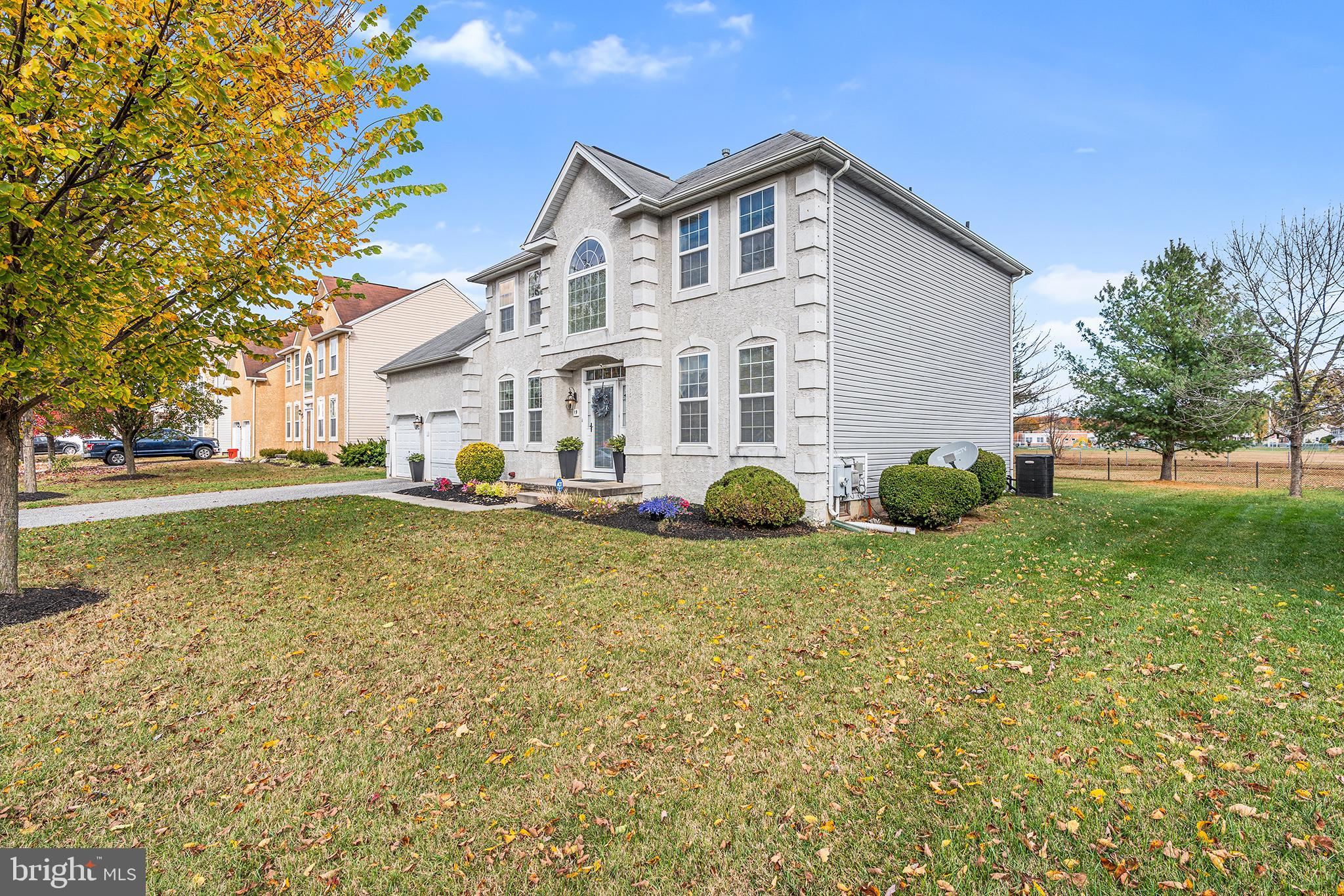 19 Howard Street Carneys Point, NJ 08069 - Photo 4 of 39 a front view of a house with garden