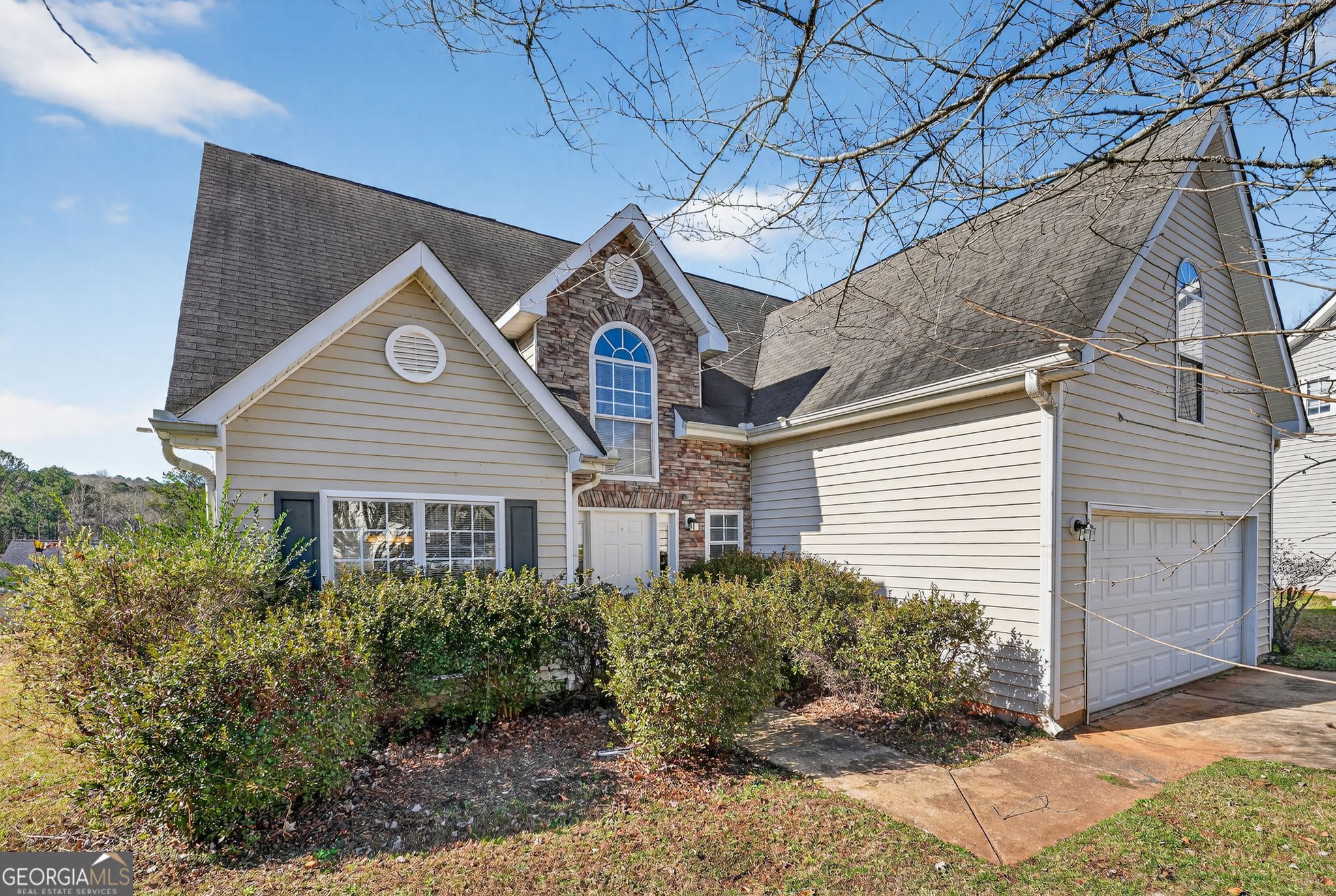 4708 Golod Way Lithonia, GA 30038 - Photo 2 of 33 a view of a house with a yard and potted plants