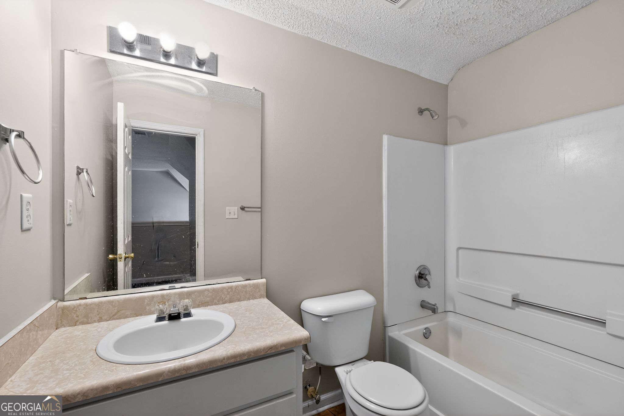 4708 Golod Way Lithonia, GA 30038 - Photo 24 of 33 a bathroom with a sink toilet and shower