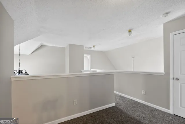 a view of cabinets and window