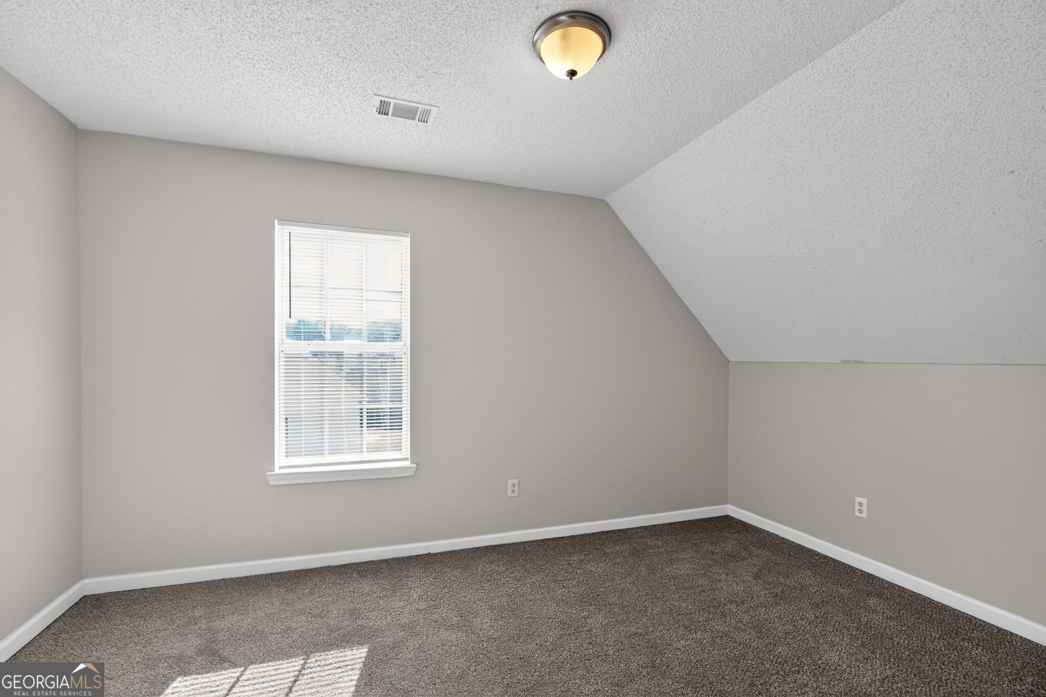 4708 Golod Way Lithonia, GA 30038 - Photo 30 of 33 an empty room with windows