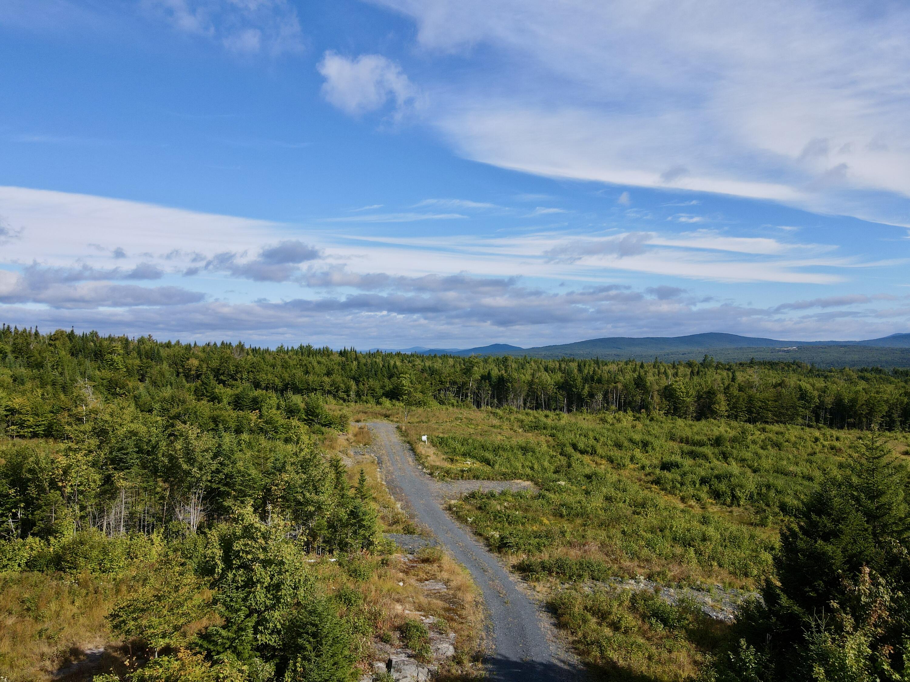 8 East Ridge Drive Greenville, ME 04441 - Photo 2 of 27 dji_fly_20250827_091346_605_175630047944