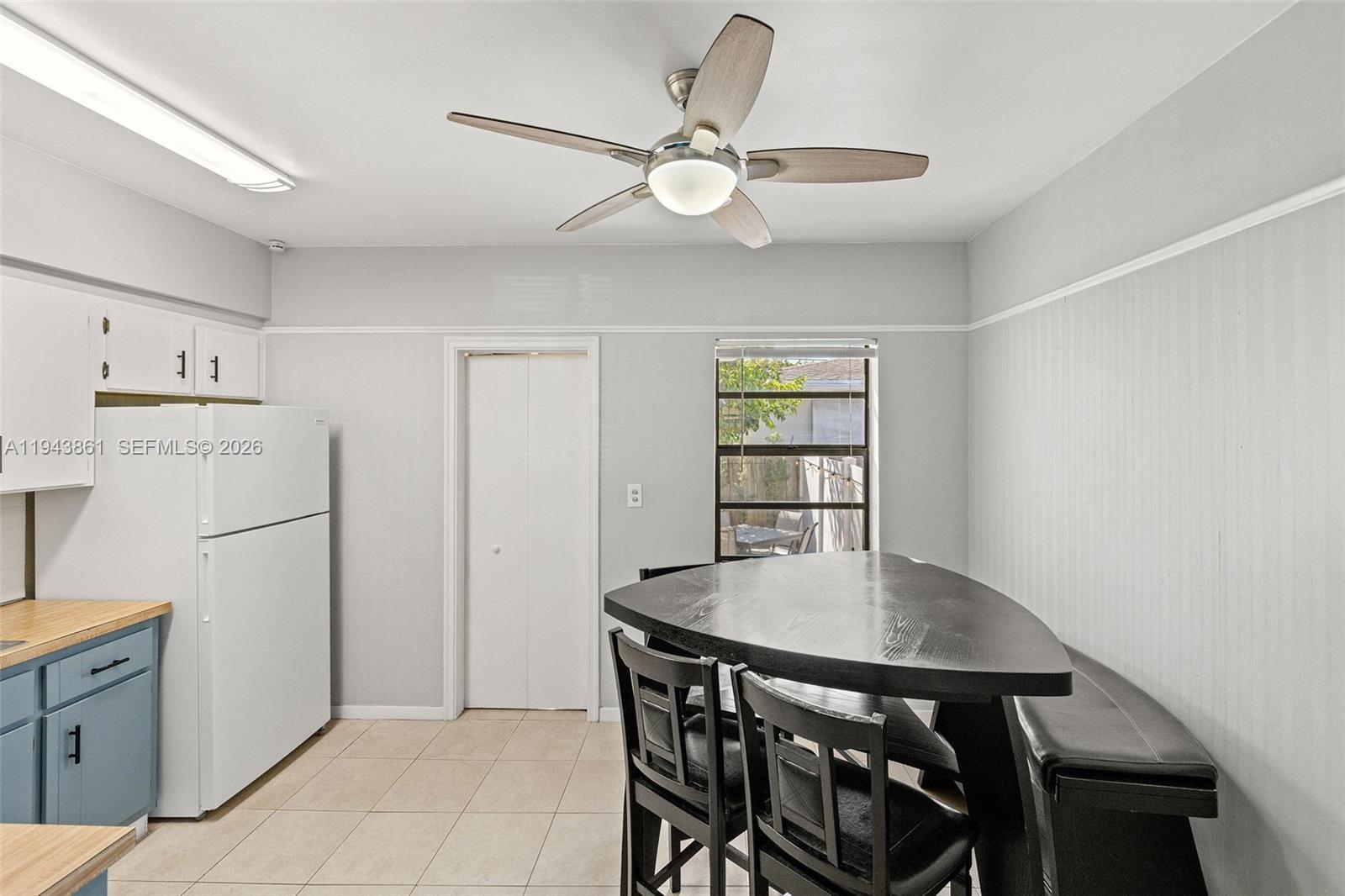 206 Southeast 5th Street Dania Beach, FL 33004 - Photo 17 of 26 a view of a dining room with furniture and wooden floor