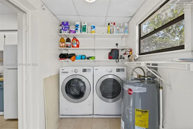 a utility room with dryer and washer