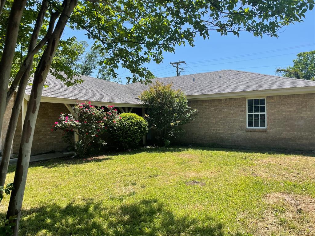 717 Bluebonnet Street Mexia, TX 76667 - Photo 2 of 25 a view of a back yard